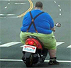 Fat man on bike